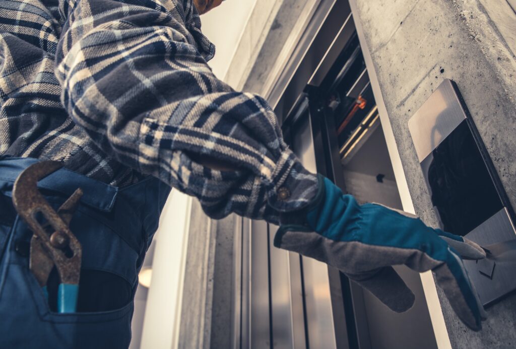 Technician Calling For Elevator